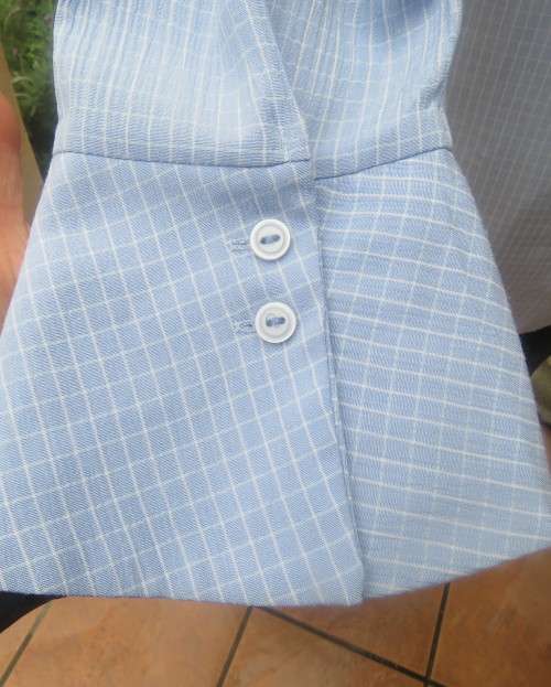 Beautiful slightly creased blue/white small check long sleeve button down top.Size 44/20.As new