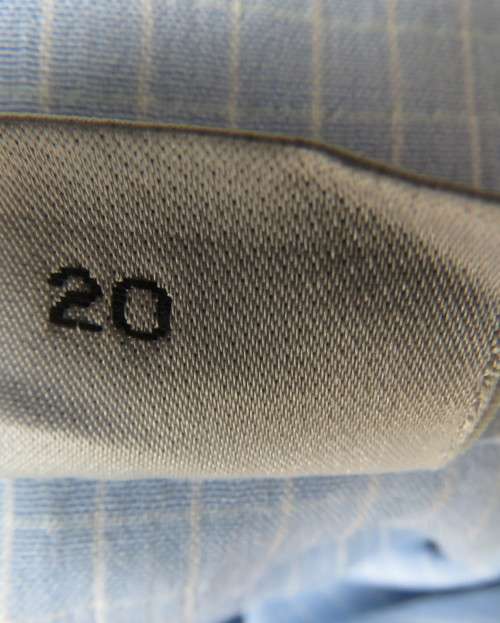 Beautiful slightly creased blue/white small check long sleeve button down top.Size 44/20.As new