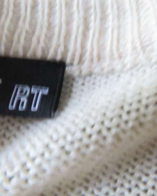 Stunning extra long soft cream acrylic knit long raglan sleeve slip over cardigan. Size 42/18.As new