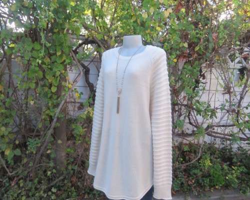 Stunning extra long soft cream acrylic knit long raglan sleeve slip over cardigan. Size 42/18.As new