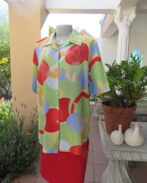 Striking colourful red/blue/yellow/green graphic print button down top.By IN CLOTHING size 42.As new