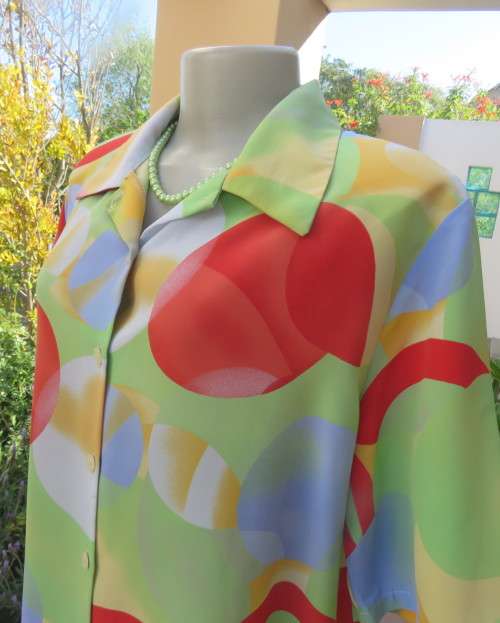 Striking colourful red/blue/yellow/green graphic print button down top.By IN CLOTHING size 42.As new