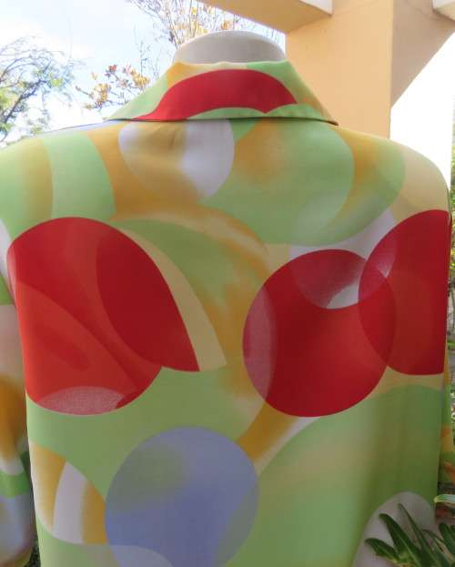 Striking colourful red/blue/yellow/green graphic print button down top.By IN CLOTHING size 42.As new