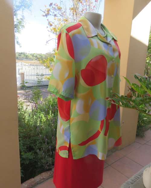 Striking colourful red/blue/yellow/green graphic print button down top.By IN CLOTHING size 42.As new
