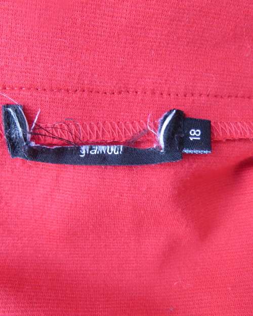 Smart red pencil skirt in red jersey fabric with some stretch.Size 42/18. Pleat at back. As new.