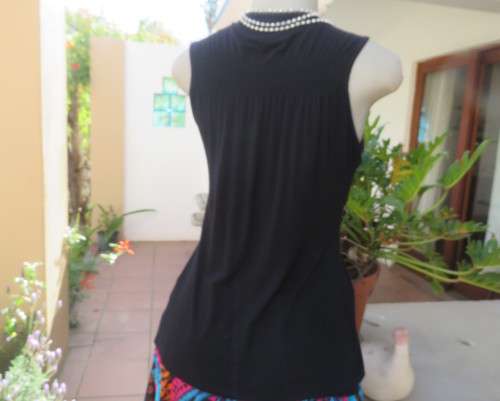 Sexy black viscose stretch sleeveless top with ruched front with buckle. IDENTITY size 38/14.As new
