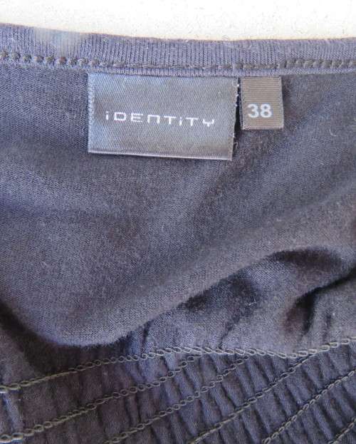 Sexy black viscose stretch sleeveless top with ruched front with buckle. IDENTITY size 38/14.As new