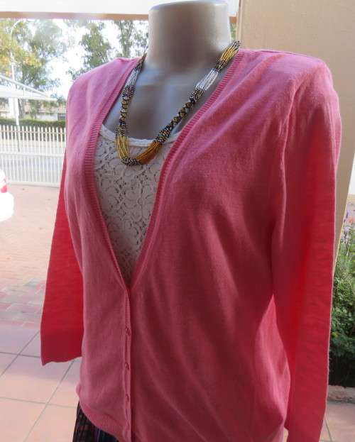 Handy light weight 100% cotton knit crimson long sleeve cardigan with V front.By WOOLWORTHS size 40