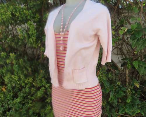 Charming champagne pink acrylic/nylon/cotton knitted button down cardigan.By TAKE OUT size 36/12.