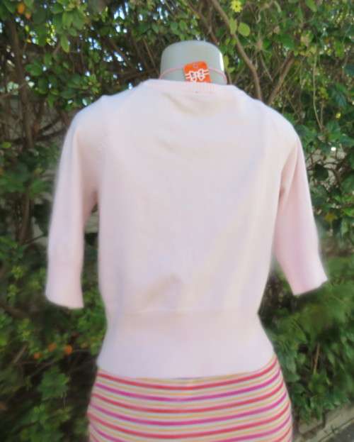 Charming champagne pink acrylic/nylon/cotton knitted button down cardigan.By TAKE OUT size 36/12.