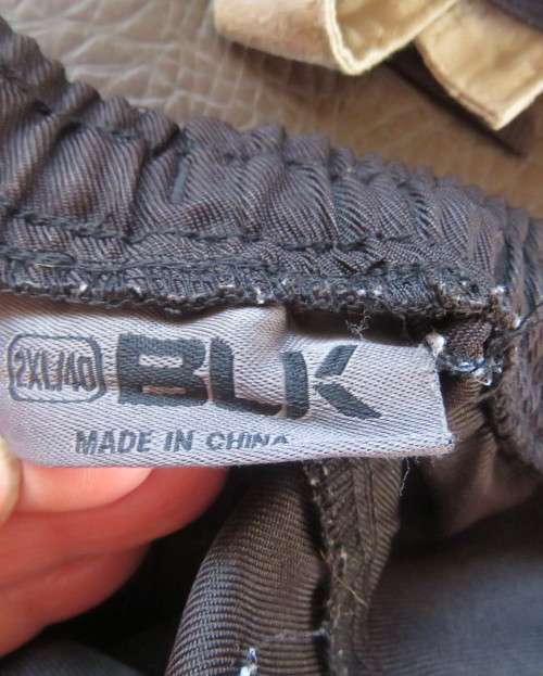 Black men`s shorts by BLK size XL in polyester with suede look inlays at sides.With logos.Drawstring