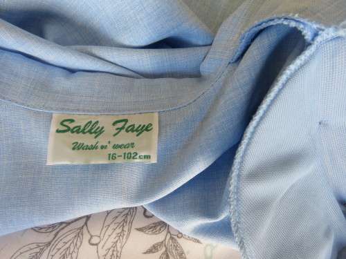 Skyblue 3 pc pant suit. Ankle ants,lace slip over top and short sleeve jacket.Size 40.By SALLY FAYE