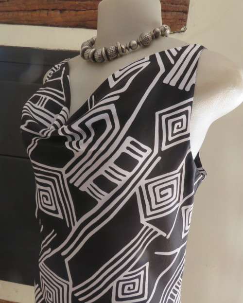 Sleek monochrome ankle length polyester dress in geometric print.Cowl neckline.Size 36/12  MILADY`S