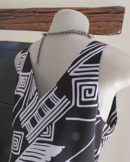 Sleek monochrome ankle length polyester dress in geometric print.Cowl neckline.Size 36/12  MILADY`S