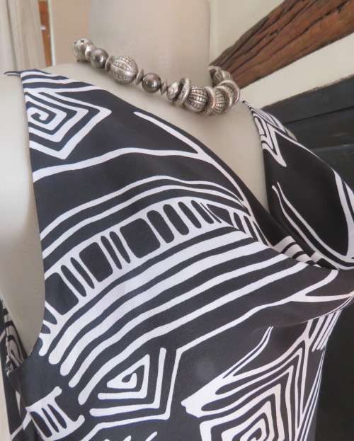 Sleek monochrome ankle length polyester dress in geometric print.Cowl neckline.Size 36/12  MILADY`S