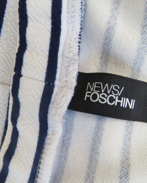 Cheeky white/navy horizontal striped textured stretch polyester skirt by NEWS size 38.Side pockets.