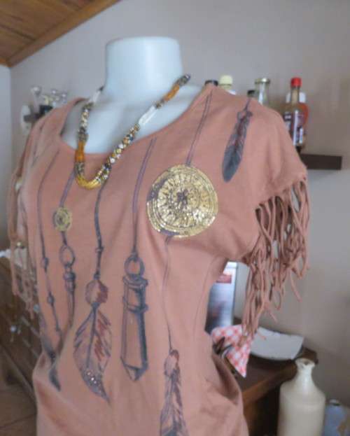 Unique golden brown LEGIT size 34/10 slip over top.Fringed armholes.Front feather/gold patterned.