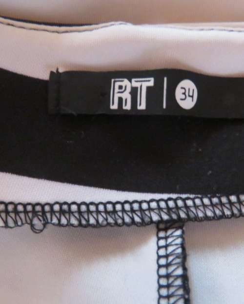 Stunning high waisted black/white striped stretch polyester size 34 shorts.By RT.As new.