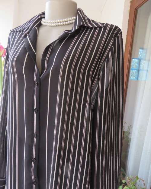 Smart,versatile black/white striped long sleeve sheer polyester top by WOOLWORTHS size 40/16.As new.