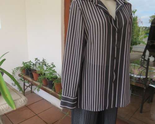 Smart,versatile black/white striped long sleeve sheer polyester top by WOOLWORTHS size 40/16.As new.