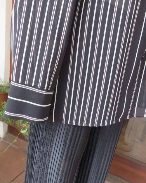 Smart,versatile black/white striped long sleeve sheer polyester top by WOOLWORTHS size 40/16.As new.
