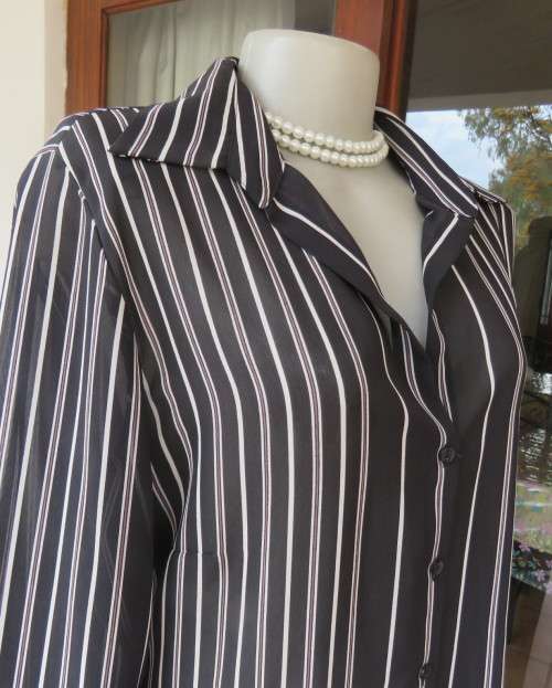 Smart,versatile black/white striped long sleeve sheer polyester top by WOOLWORTHS size 40/16.As new.