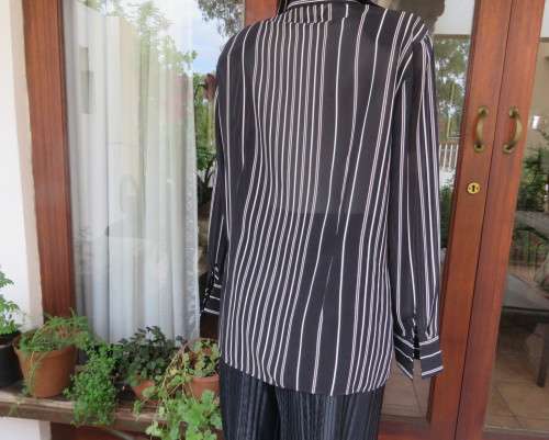 Smart,versatile black/white striped long sleeve sheer polyester top by WOOLWORTHS size 40/16.As new.