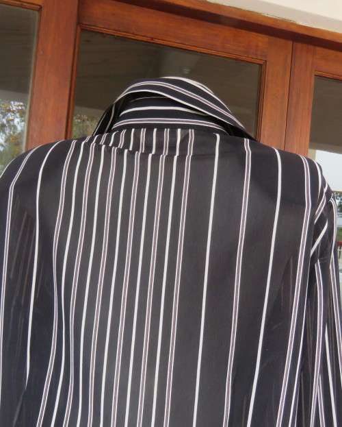 Smart,versatile black/white striped long sleeve sheer polyester top by WOOLWORTHS size 40/16.As new.