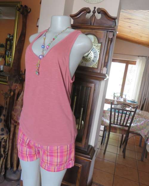 Soft viscose dark salmon vest style top with some stretch. Size 38/14 by EDITION .New condition.
