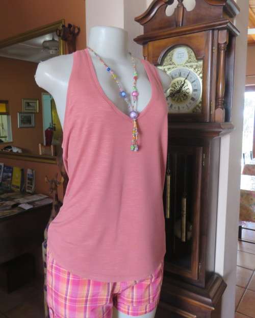 Soft viscose dark salmon vest style top with some stretch. Size 38/14 by EDITION .New condition.