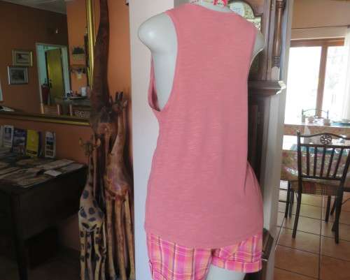 Soft viscose dark salmon vest style top with some stretch. Size 38/14 by EDITION .New condition.