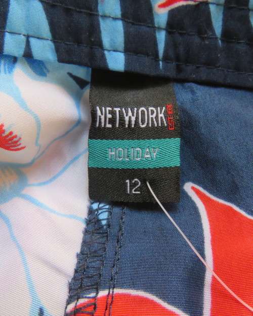 Holiday mood boarshorts!! Navy with red/white floral pattern.Front pockets.Front tiestrings.Size 36.