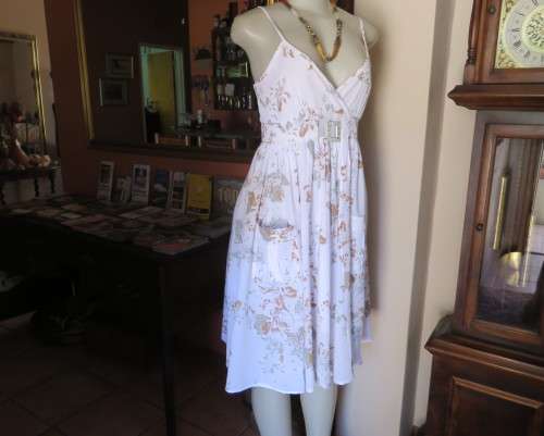 Awesome cool summer strappy dress in white /grey/brown flowers.Size 36/12.Fold over bust.As new