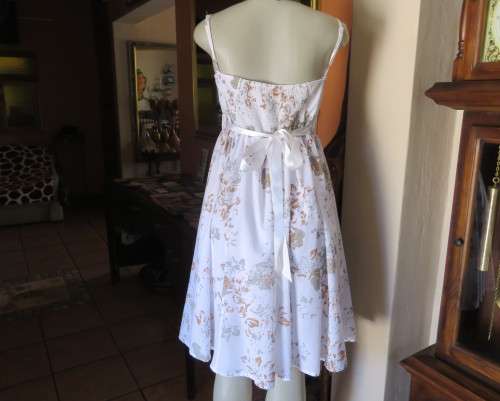 Awesome cool summer strappy dress in white /grey/brown flowers.Size 36/12.Fold over bust.As new
