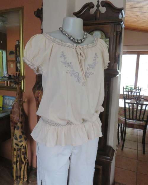 Peasant style rich cream embroidered slip over top by MILADY`S size 40/16.100% cotton.As new.