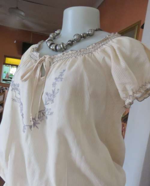 Peasant style rich cream embroidered slip over top by MILADY`S size 40/16.100% cotton.As new.