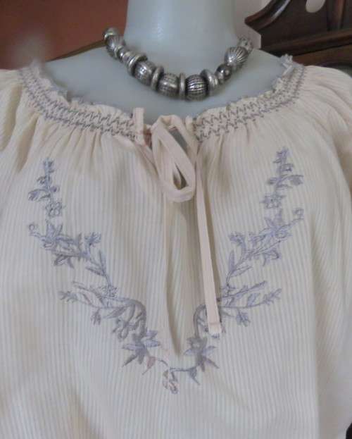 Peasant style rich cream embroidered slip over top by MILADY`S size 40/16.100% cotton.As new.