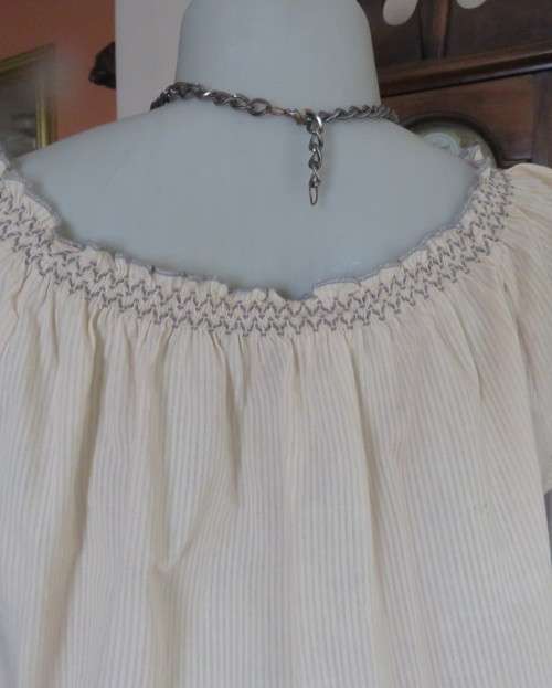 Peasant style rich cream embroidered slip over top by MILADY`S size 40/16.100% cotton.As new.