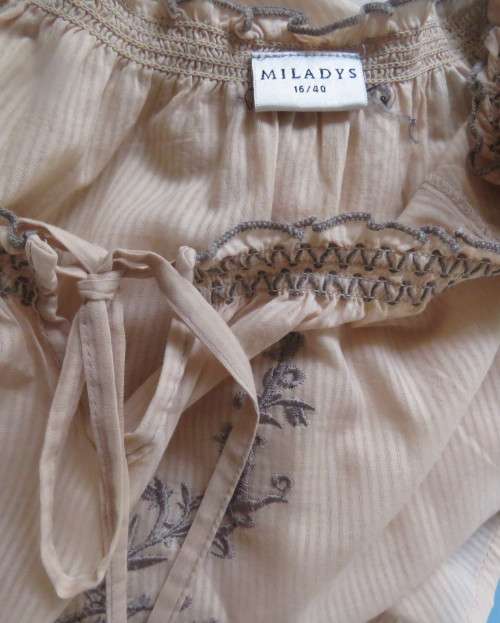Peasant style rich cream embroidered slip over top by MILADY`S size 40/16.100% cotton.As new.