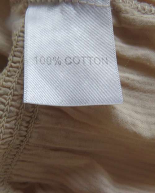 Peasant style rich cream embroidered slip over top by MILADY`S size 40/16.100% cotton.As new.