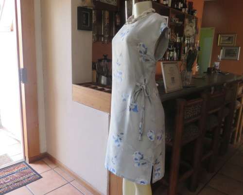 Cool light blue floral shift dress in poly/viscose.Slip over, sleeveless,round neckline. Size 37/13.