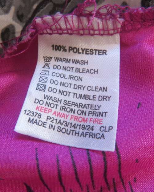 Silky polyester capped blouson V neck tie collar size 42/18 top in animal print.As new