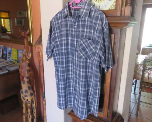 Cool navy/white check short sleeve casual Men`s shirt in polycotton.One front pocket.Size XL.As new.