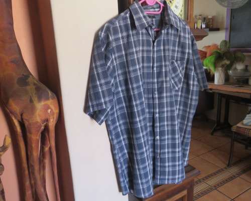 Cool navy/white check short sleeve casual Men`s shirt in polycotton.One front pocket.Size XL.As new.