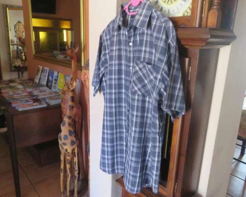 Cool navy/white check short sleeve casual Men`s shirt in polycotton.One front pocket.Size XL.As new.