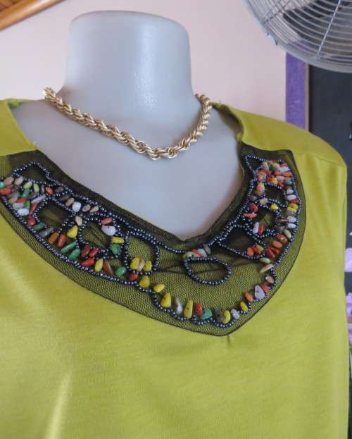 Stunning slip over avo green long sleeve polyester/viscose top size 44/20.Front embellishment.As new