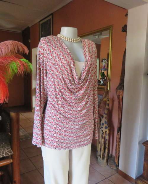 Smart soft long sleeve top in cream/brown/red block pattern.Cream underlay.Size 42/18.Cowl collar.