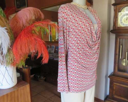 Smart soft long sleeve top in cream/brown/red block pattern.Cream underlay.Size 42/18.Cowl collar.