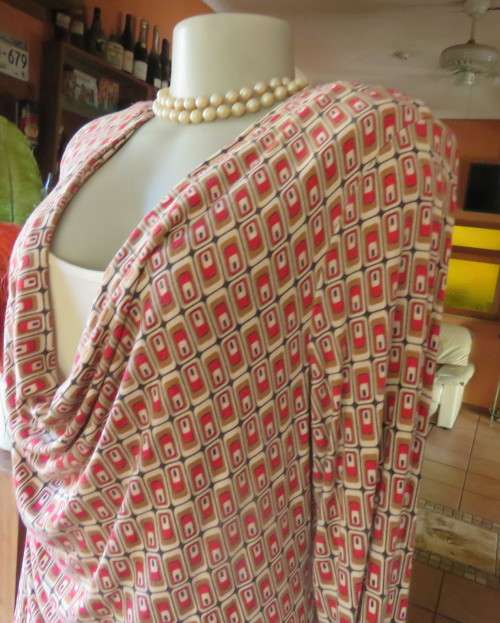 Smart soft long sleeve top in cream/brown/red block pattern.Cream underlay.Size 42/18.Cowl collar.