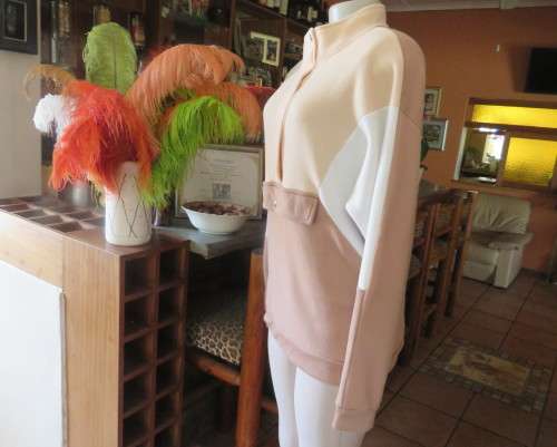 Cosy, warm cream/tan/white colour block long sleeve brushed polyester top.Size 38/14.Dolman sleeves.